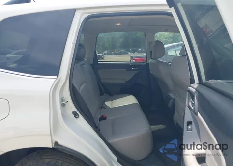 2015 Subaru Forester 2.5I Touring из США, поврежденный, VIN JF2SJAUCXFH435104